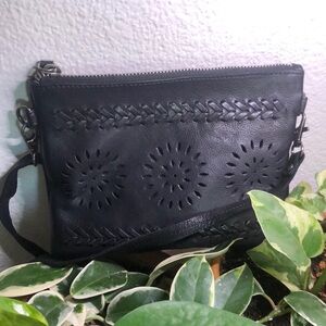 This is Latico crossbody/ wristlet leather bag